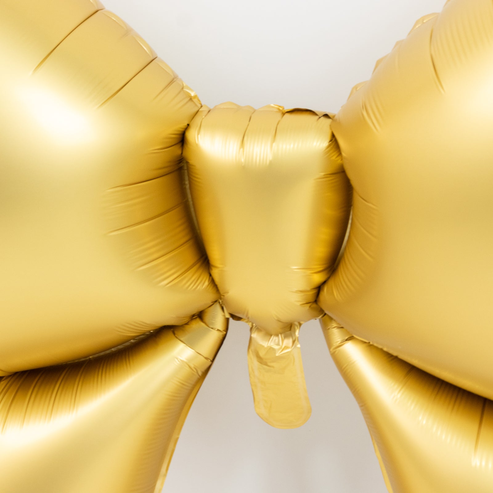10 Pack Giant Decorative Foil Bow Balloons – Matte Gold Party Balloons for Backdrop, Photo Booth & Event Styling, 29″ x 27″ Inflated